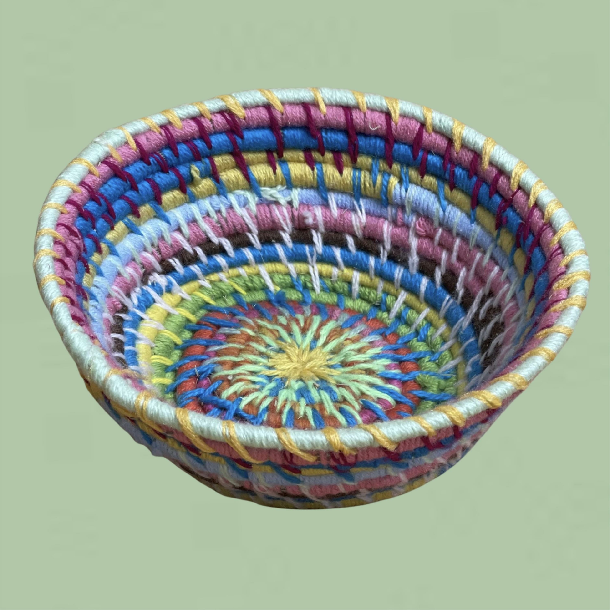 Colourful woven basket by Warruyanta artist Anne Ovi (324-22)